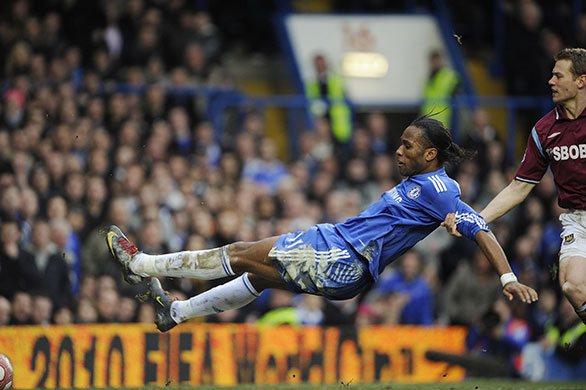 Chelsea v West Ham: Drogba is pulled back in the area but the ref didn't give a penalty