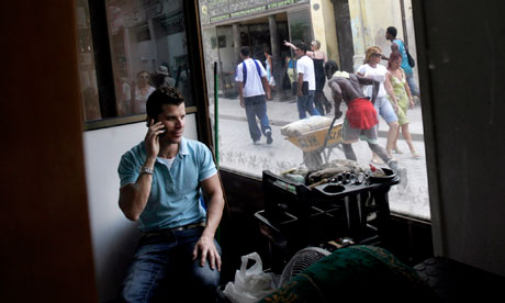 A man talks on his phone in Old Havana, Cuba