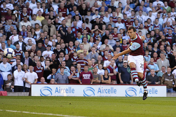 Title race gallery: Robbie Blake scores the only goal of the game as Burnley beat Man United