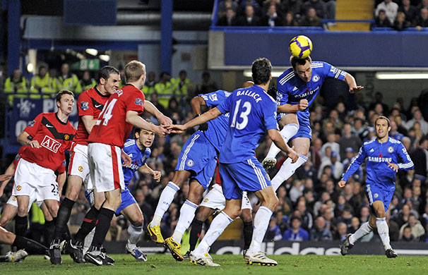 Title race gallery: Chelsea captain John Terry scores the only goal of the game against Man Utd