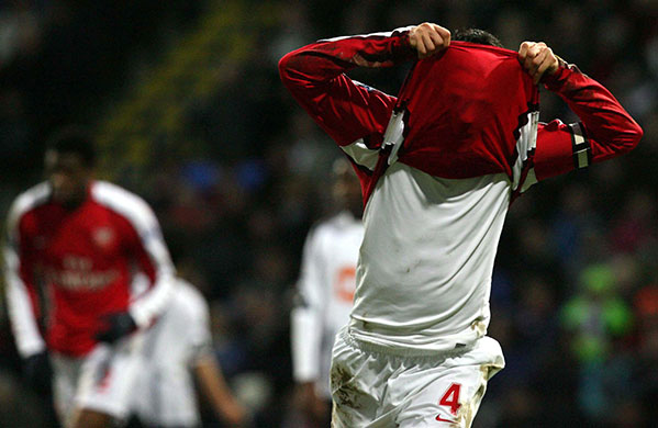 Title race gallery: Arsenal's captain Cesc Fabregas celebrates scoring against Bolton