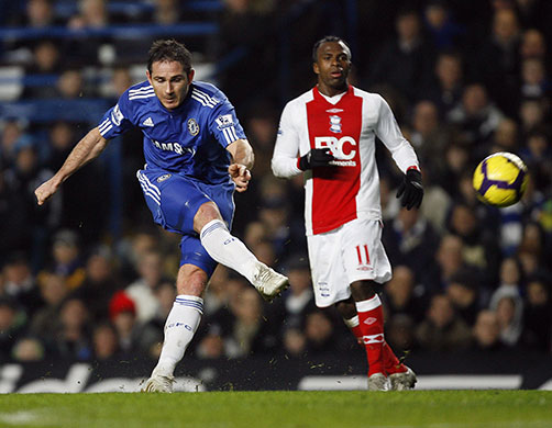 Title race gallery: Chelsea's English midfielder Frank Lampard shoots against Birmingham