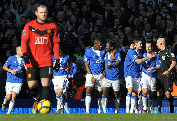 Title race gallery: Everton celebrate after Dan Gosling scores
