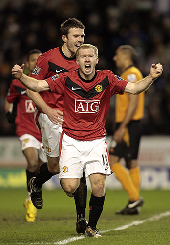 Title race gallery: Paul Scholes celebrates scoring his 100th Premier League goal