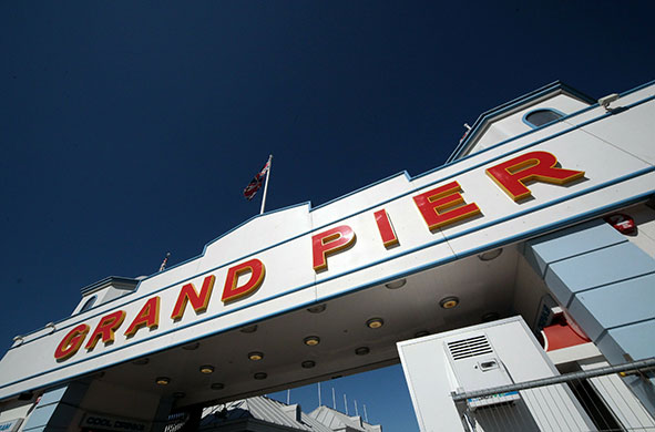 Grand Pier: The sun shines on the on Grand Pier entrance