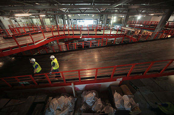 Grand Pier: Construction workers inspect the indoor go-kart circuit