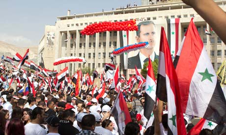 Assad supporters in Damascus on Wednesday