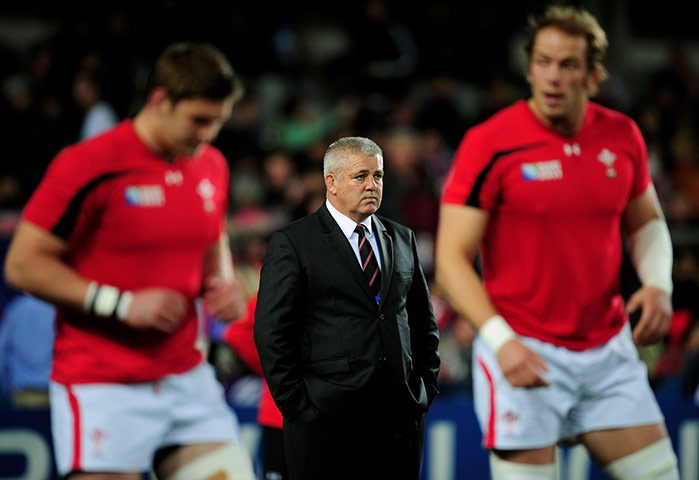 Wales v France RWC semi: Wales' head coach Warren Gatland watches over his team's pre match warm up