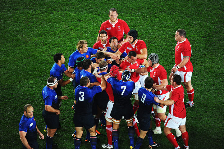 Wales v France RWC Semi: French and Welsh players clash