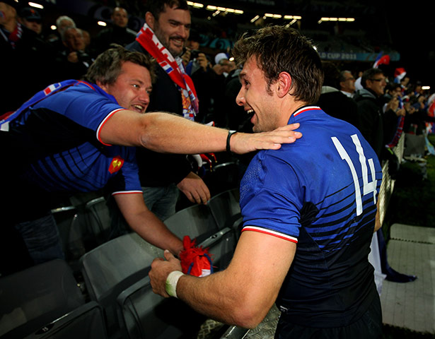 Wales v France RWC Semi: France wing Vincent Clerc celebrates with the fans 