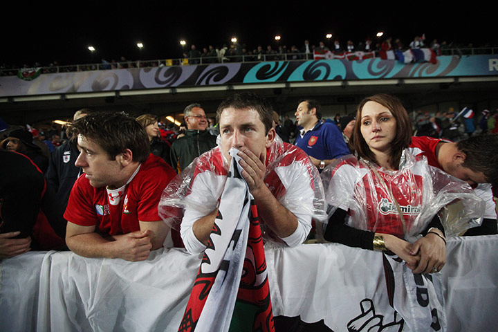 Wales v France RWC Semi: Wales's fans look dejected and cry after they where beaten by France