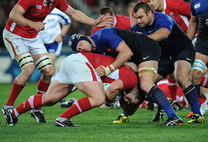 Wales v France RWC Semi: France's flanker Julien Bonnaire (R) vies with Wales' Paul James 