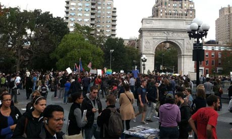 Occupy Wall Street protesters listen to speeches in Washington Square