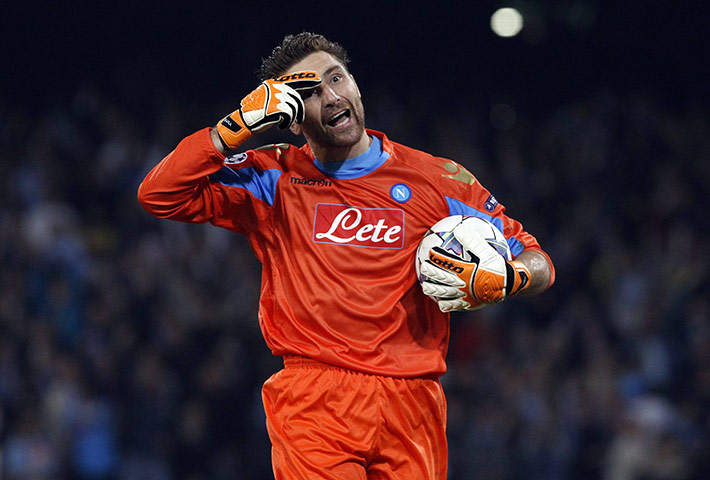 Tuesday Champions League: Napoli goalkeeper De Sanctis reacts after saving a penalty against Bayern