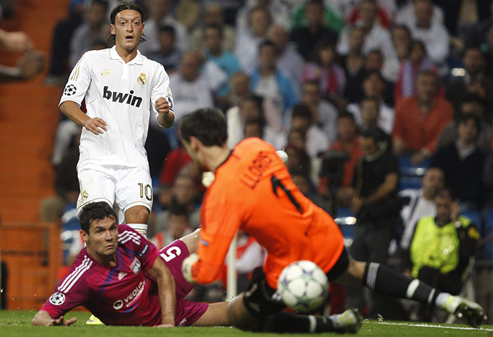 Tuesday Champions League: Real Madrid's Ozil shoots and the ball goes in off Olympique Lyon's Lloris