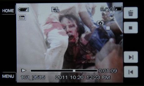 An image purportedly showing Muammar Gaddafi's capture in Sirte, Libya on 20 October 2011