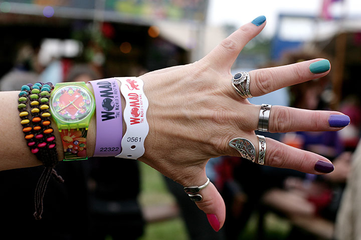 UK Festivals Exhibition: An arm full of wristbands at WOMAD, 2011