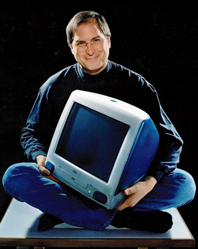 steve jobs dies: 1998: Jobs holds the iMac at the all-in-one computer's launch in California
