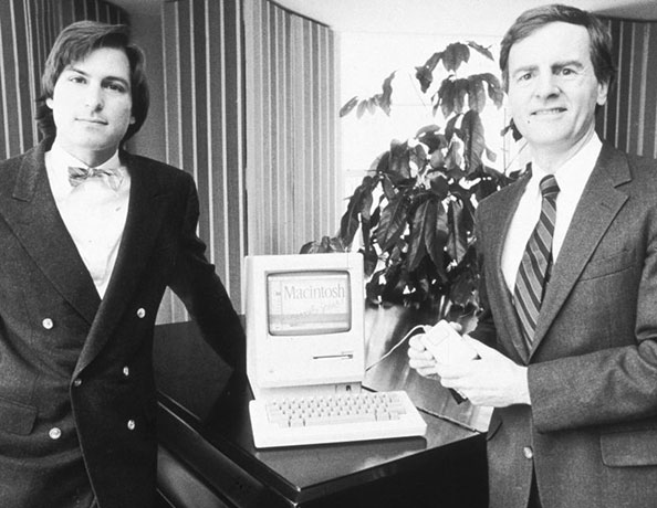 steve jobs dies: 16 January 1984: Jobs with John Sculley, who eventually ousted Jobs