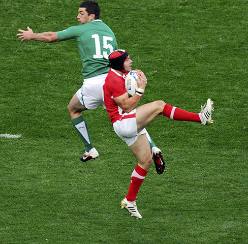 Ireland v Wales: Wales' Leigh Halfpenny takes a high ball next to Ireland's Rob Kearney