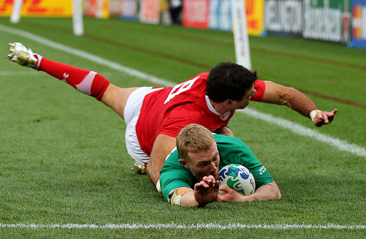 Ireland v Wales: Keith Earls dives past Mike Phillips and scores a try v Wales