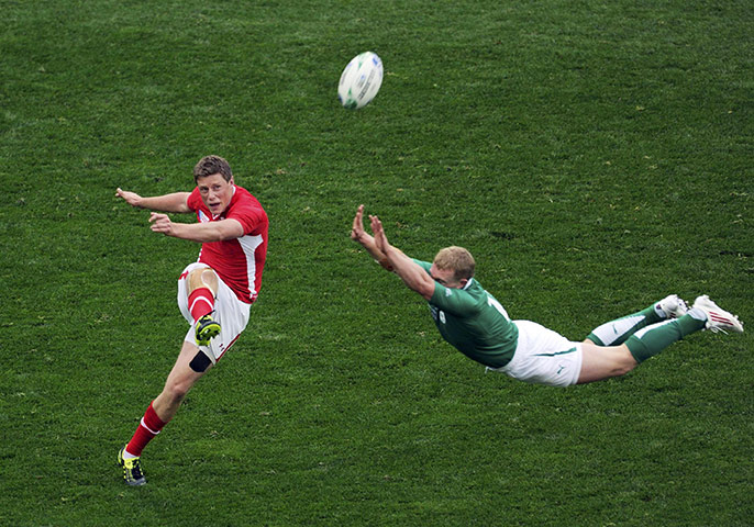 Ireland v Wales: Keith Earls attempts to block a kick by Rhys Priestland 