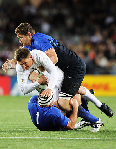 England v France: Toby Flood is tackled by Pascal Pape and Jean-Baptiste Poux 
