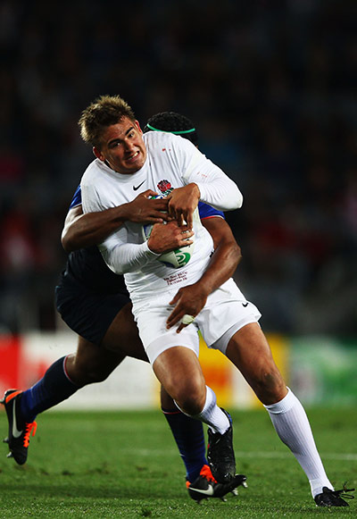 England v France: Toby Flood of England is tackled by Thierry Dusautoir of France