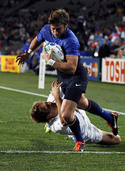England v France: Jonny Wilkinson fails to prevent Maxime Medard from scoring a try