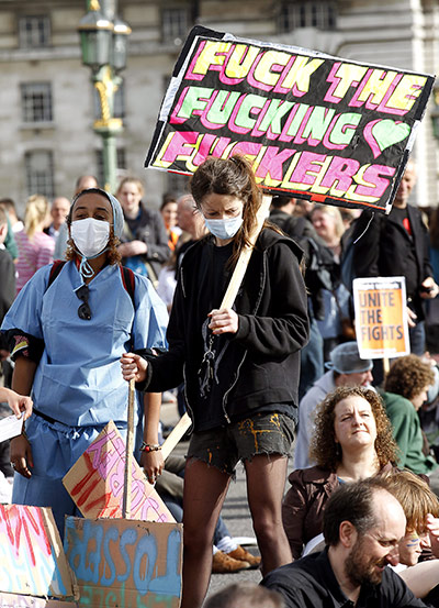 http://static.guim.co.uk/sys-images/Guardian/Pix/pictures/2011/10/9/1318182299594/NHS-cuts-protest--002.jpg 