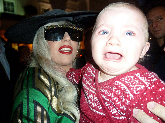 Week in music: Lady Gaga Holds and Kisses Baby in London