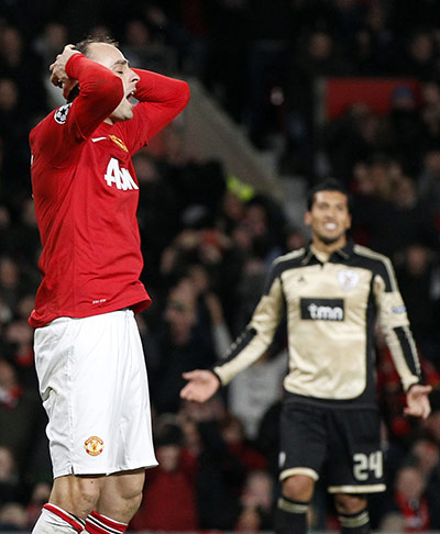 Tuesday Champions League: Manchester United's Berbatov reacts after missing a chance to win the match