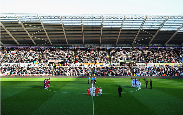 Sunday football: A minute's silence ahead of the Swansea City v Aston Villa match