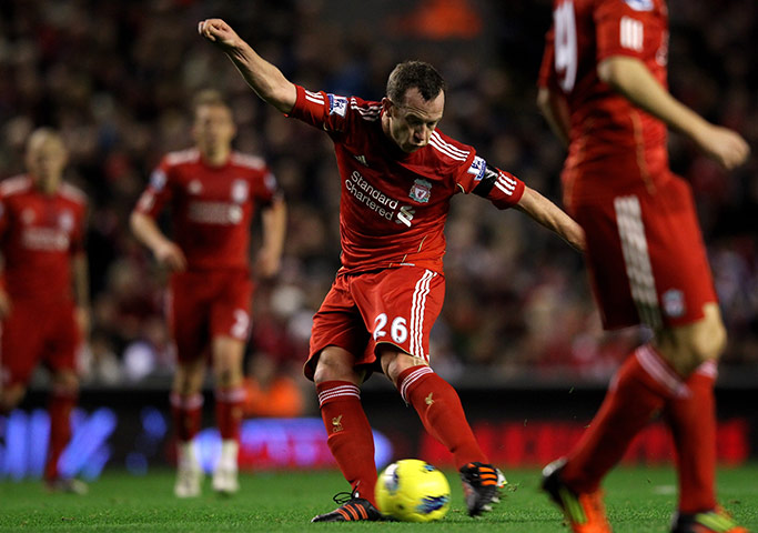 Sunday football: Liverpool's Charlie Adams shoots against Manchester City