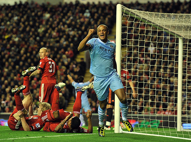 Sunday football: Manchester City's Vincent Kompany celebrates scoring against Liverpool