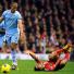 Sunday football: Luis Suarez is fouled by Vincent Kompany