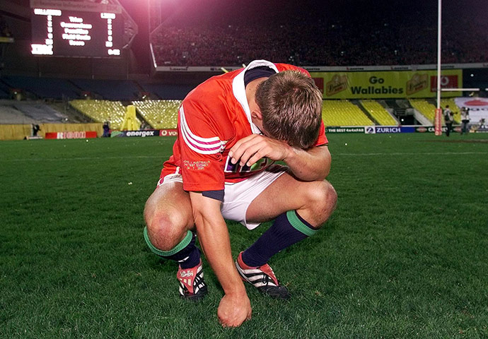 Jonny Wilkinson Retires: Jonny Wilkinson falls to his knees, after his team lost against Australia