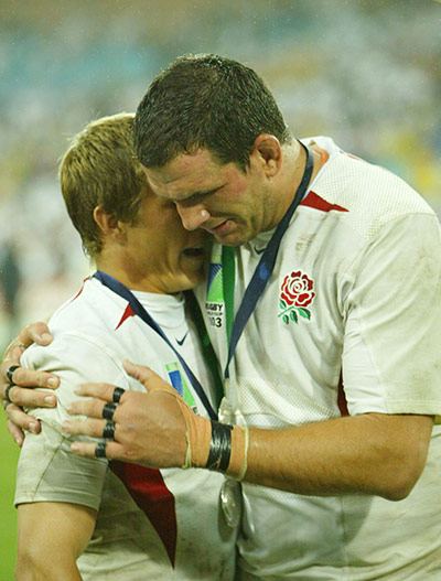Jonny Wilkinson Retires: Martin Johnson hugs Jonny Wilkinson after winning the Rugby World Cup