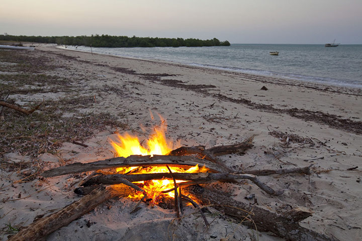 Mozambique dhow trip: driftwood campfire