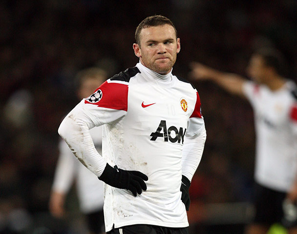Champions League Wed: Dejected Wayne Rooney after Man United crashed out of the Champions League