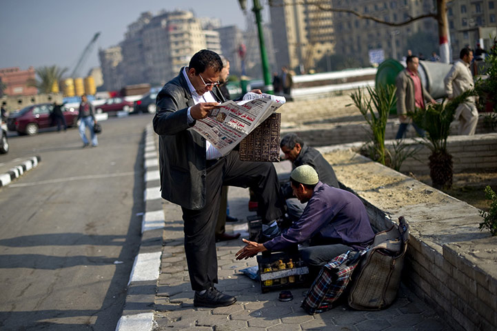 An-Egyptian-man-reads-a-n-002.jpg