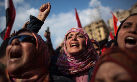 Egyptian anti-Mubarak protesters shout slogans during a demonstration in Tahrir square, Cairo, Egypt