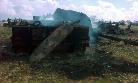 Debris of wrecked military vehicles destroyed in air strikes by the coalition west of Benghazi Libya