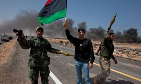 Libyan rebels celebrating west of Ras Lanuf