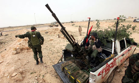 Anti-Gaddafi forces near Brega in Libya