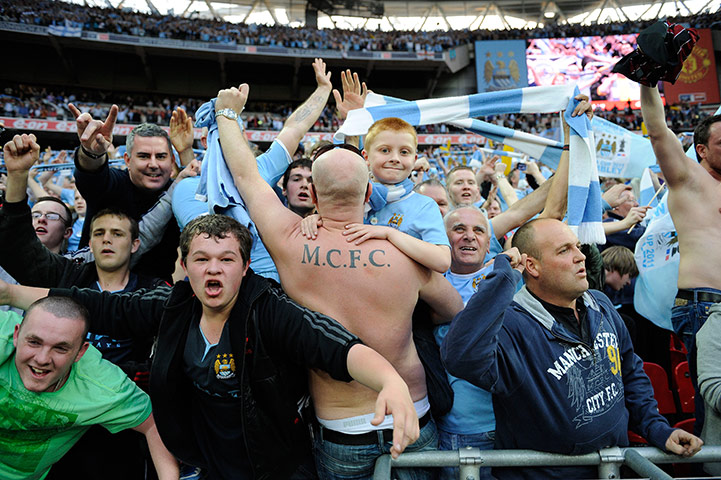 Man City v Man Utd: Manchester City fans celebrate at the end 