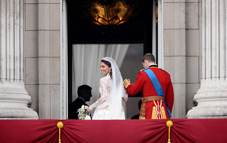 Wedding procession: Kate, Duchess of Cambridge, smiles next to her husband