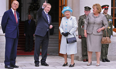 Irish Prime Minister Enda Kenny greets Queen Elizabeth at Goverment Buildings in Dublin, Ireland
