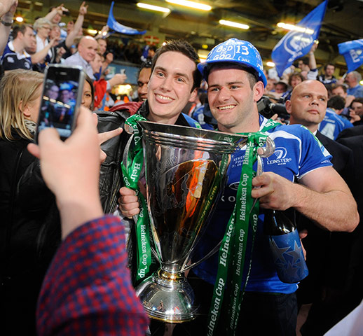 Heineken Cup Final: A fan poses with the Heineken Cup trophy and Fergus McFadden