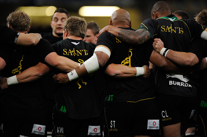 Heineken Cup Final: Northampton players huddle before the game